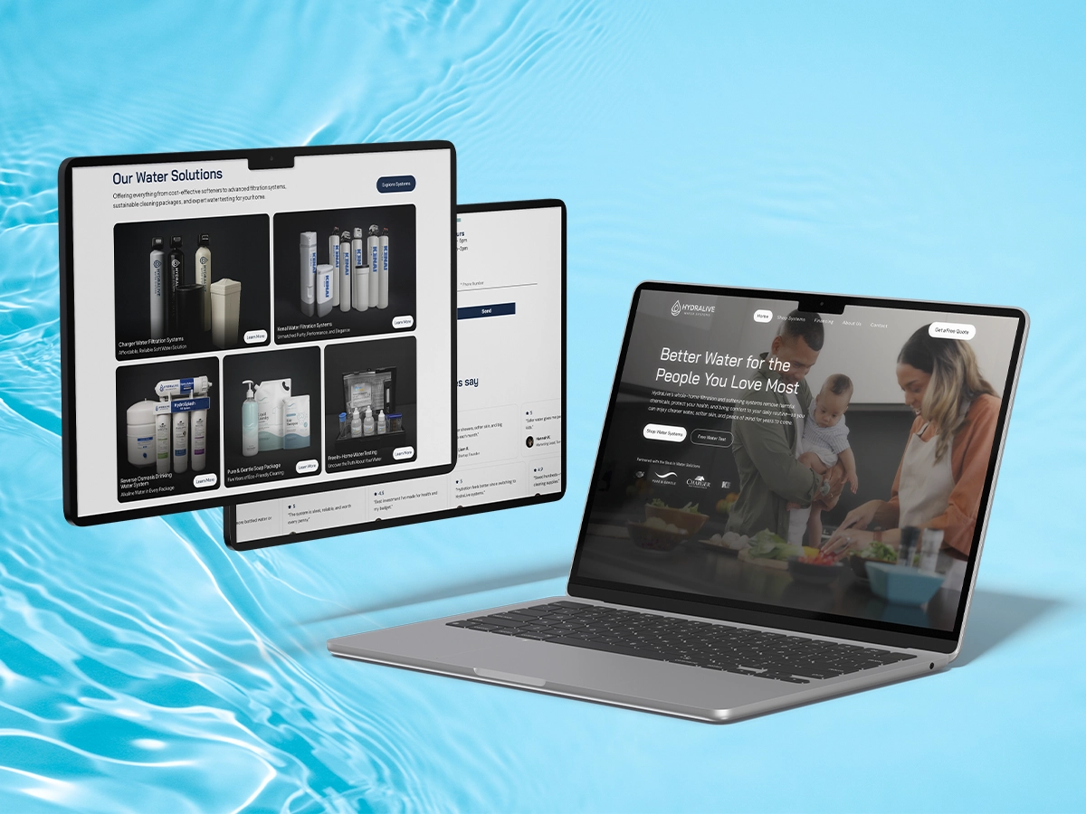Laptop and tablet screens displaying the HydraLive water solutions website with product offerings and a family-focused homepage design.